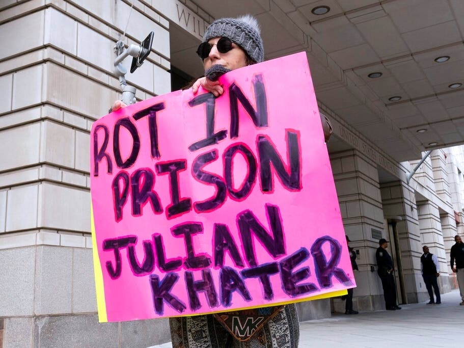 Brianne Chapman protests during the sentencing hearing for Julian Khater and George Tanios at the federal courthouse in Washington. Khater was sentenced to 80 months in prison Friday for attacking officer Brian Sicknick at the U.S. Capitol on Jan. 6.