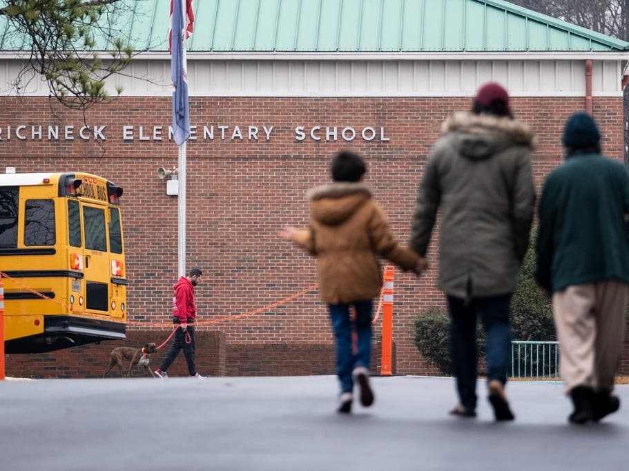 The Virginia school district where a 6-year-old shot his teacher argues that her injuries fall under the state's workers compensation act and cannot be addressed through her $40 million lawsuit.