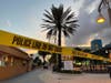 Police cordon off an area as they respond to a shooting near the Hollywood Beach Broadwalk in Hollywood, Florida, on Monday evening.