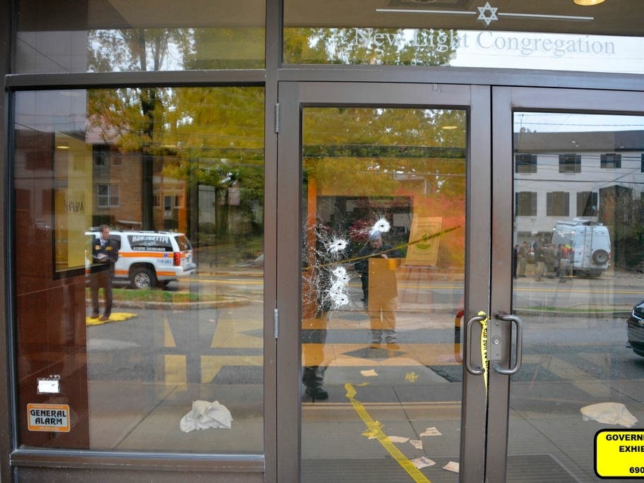 This photo of bullet-damaged doors in the Tree of Life synagogue building in Pittsburgh was entered June 1 as a court exhibit by prosecutors in the federal trial of Robert Bowers.