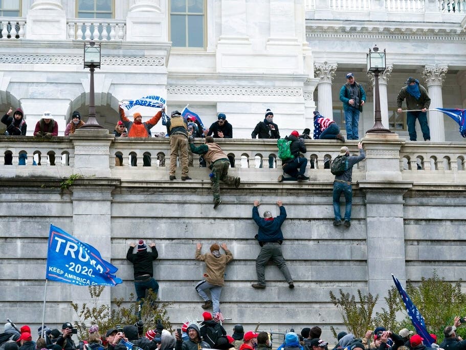 Carlos Ayala, a member of the Maryland State Board of Elections, was arrested and charged this week after federal authorities said he took part in the Jan. 6, 2021, attack on the U.S. Capitol.