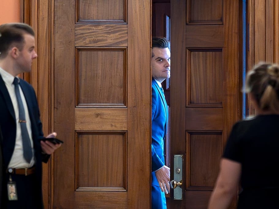 President-elect Donald Trump's nominee to be attorney general, former Rep. Matt Gaetz, R-Fla., closes a door to a private meeting with Vice President-elect JD Vance and Republican Senate Judiciary Committee members.