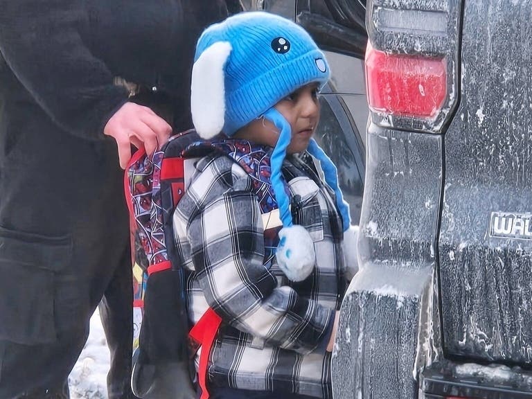 Liam Conejo Ramos, 5, is detained by U.S. Immigration and Customs Enforcement officers after arriving home from preschool, Tuesday, Jan. 20, in the Minneapolis suburb of Columbia Heights.