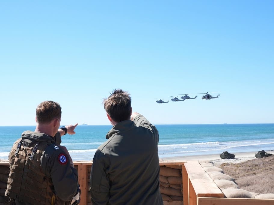 Vice President JD Vance, right, watches a demonstration by Marines during activities to mark the upcoming Marine Corps' 250th anniversary Saturday, Oct 18, 2025, on Marine Corps Base Camp Pendleton in Camp Pendleton, Calif.