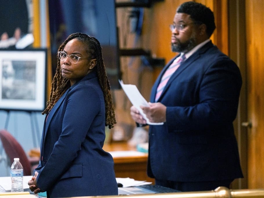 Ebony Parker looks on during jury selection for her trial on felony child neglect charges at the Newport News Circuit Court in Newport News on Monday.