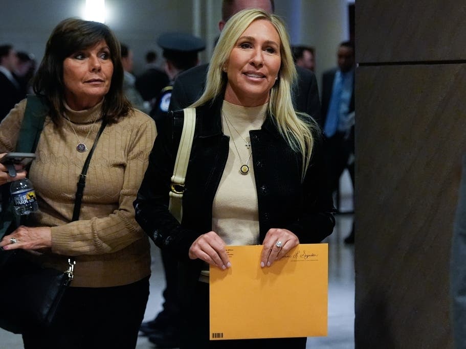 Rep. Marjorie Taylor Greene, R-Ga., departs a briefing on military strikes near Venezuela, Tuesday, Dec. 16, 2025, at the Capitol in Washington.