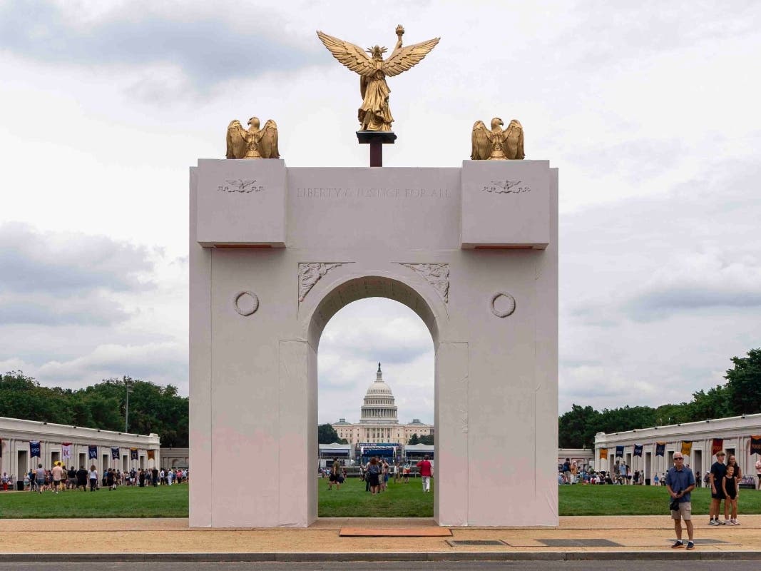 A mockup of President Donald Trump's proposed triumphal arch stands at the Great American State Fair on the National Mall, June 27, 2026, in Washington.