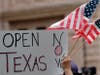 Protesters rally at the Texas State Capitol to speak out against Texas' handling of the COVID-19 outbreak.
