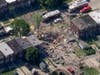 This photo provided by WJLA-TV shows the scene of an explosion in Baltimore on Aug. 10. Baltimore firefighters say an explosion has leveled several homes in the city.