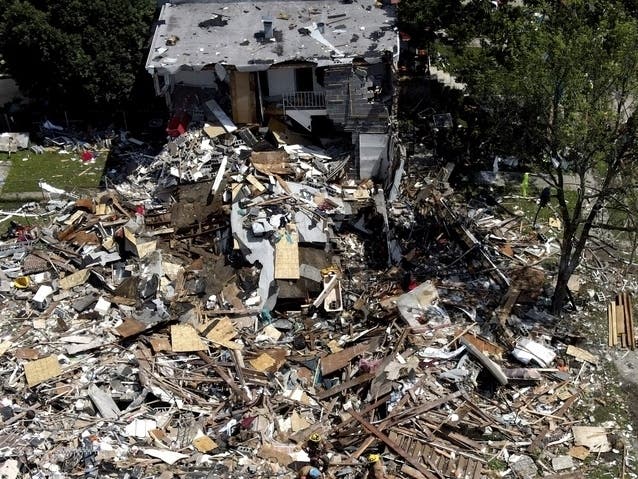 Debris and rubble covers the ground in the aftermath of an explosion in Baltimore on Monday, Aug. 10.