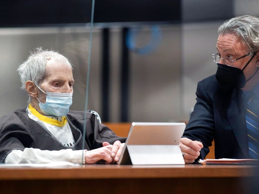 Robert Durst, left, seated with defense attorney David Chesnoff, is sentenced to life without possibility of parole for killing Susan Berman, Thursday, Oct. 14, 2021 at the Airport Courthouse in Los Angeles.