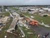 Emerald Isle town employees work to clear the road after a tornado hit Emerald Isle N.C. as Hurricane Dorian moved up the East coast on Thursday, Sept. 5, 2019. 
