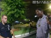 This image taken from body camera video provided by the Atlanta Police Department shows Rayshard Brooks speaking with former Officer Garrett Rolfe in the parking lot of a Wendy's restaurant, late Friday, June 12, in Atlanta. Rolfe shot Brooks as he fled.