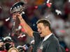 Tampa Bay Buccaneers quarterback Tom Brady celebrates with the Vince Lombardi Trophy after winning NFL Super Bowl 55 31-9 against the Kansas City Chiefs.