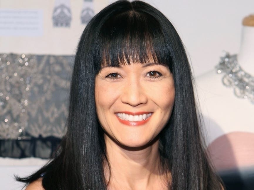  In this March 6, 2010 file photo, Suzanne Whang attends the Sue Wong Fall 2010 Preview, in Los Angeles. Whang, whose smooth, calm voice provided the narration for HGTV's "House Hunters" for years, died Tuesday, Sept. 17, 2019