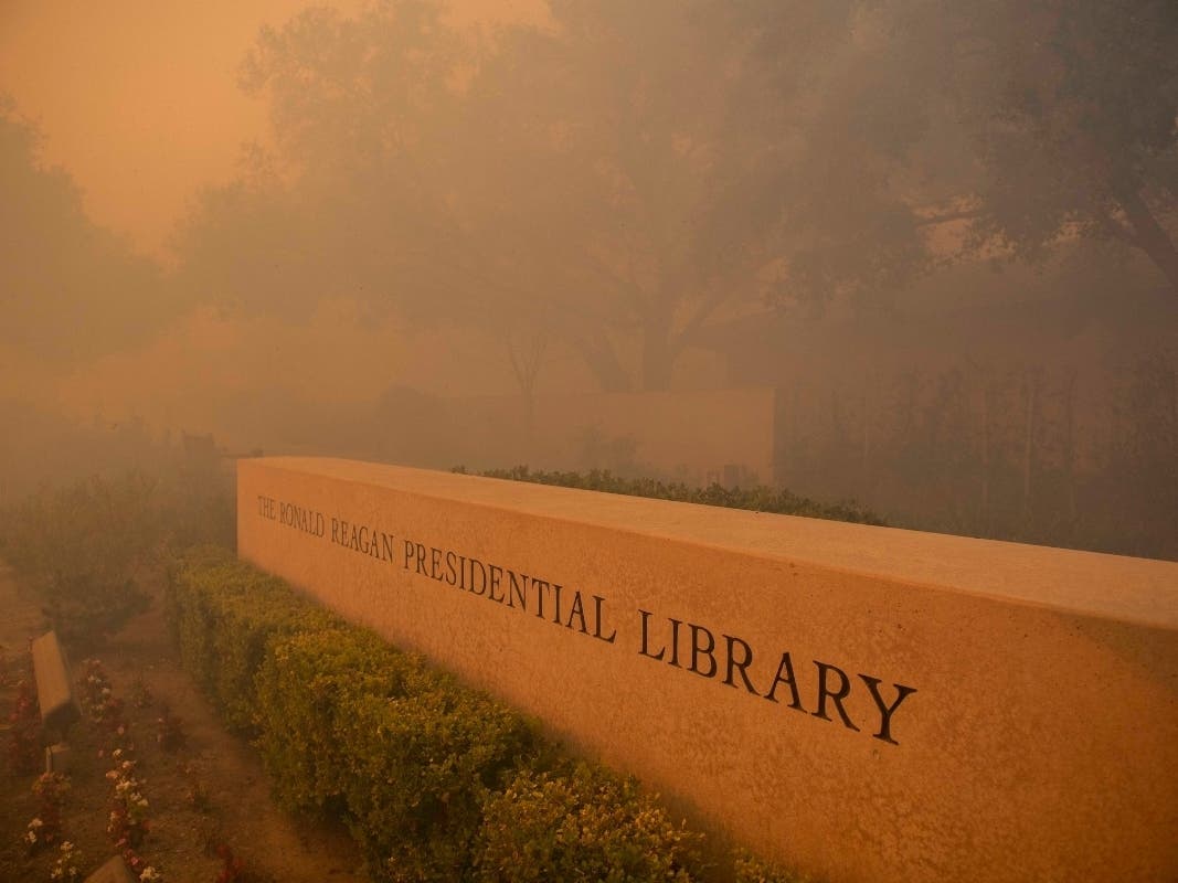 Smoke engulfs the Ronald Reagan Library during the Easy Fire on Wednesday in Simi Valley, California.