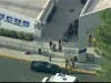People are lead out of Saugus High School after reports of a shooting on Thursday, Nov. 14, 2019 in Santa Clarita, Calif.  The Los Angeles County Sheriff’s Department says on Twitter that deputies are responding to the high school about 30 miles (48 kilom