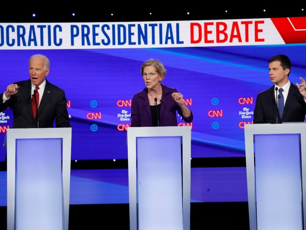 Democratic presidential candidates (from left) former Vice President Joe Biden, U.S. Sen. Elizabeth Warren and South Bend Mayor Pete Buttigieg take part a Democratic presidential primary debate.