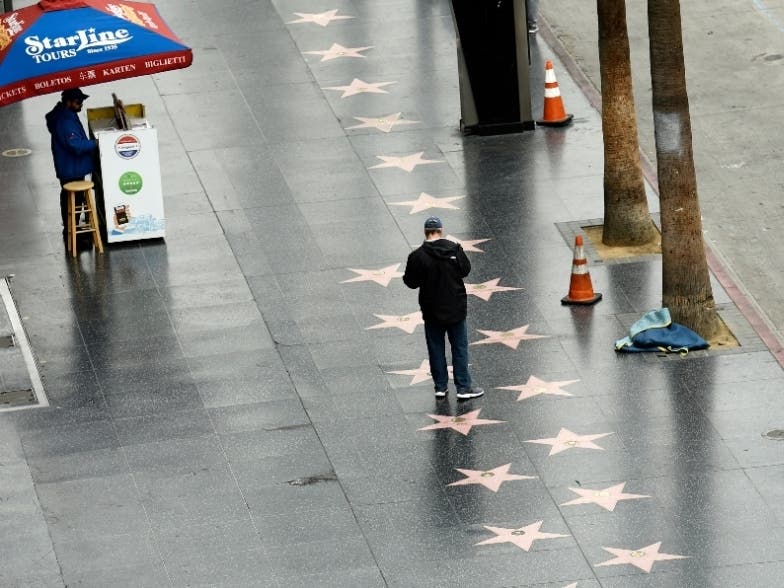 Normally crowded tourist havens suchs as the Hollywood Walk of Fame were empty Thursday.