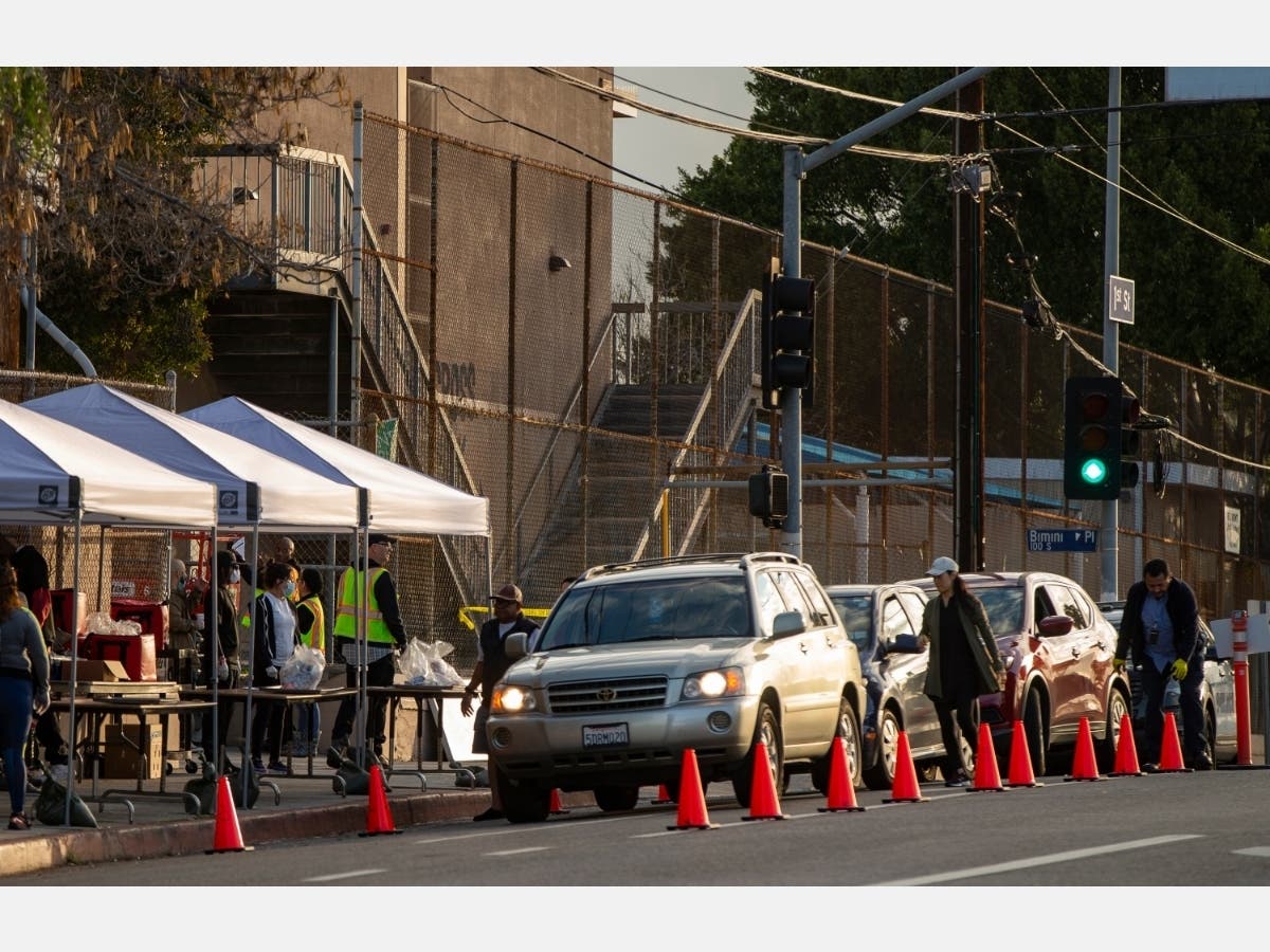A drive-up coronavirus testing location sees cars lined up in Los Angeles, California.