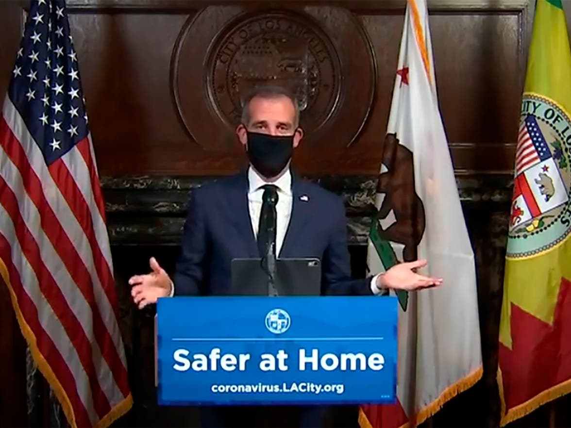 Mayor Eric Garcetti's new order requires people walking down the street or strolling a beach to where a mask or face covering.