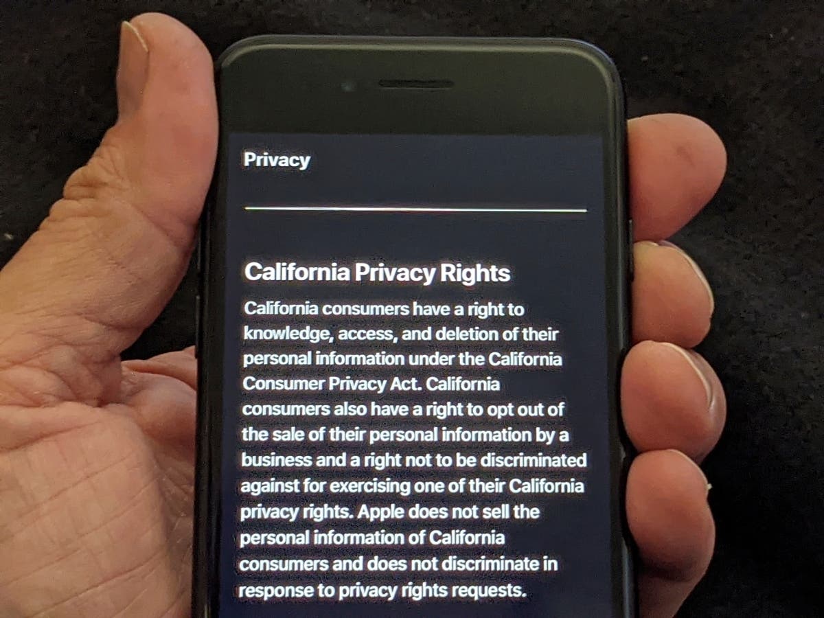This photo illustration shows Apple's privacy policy on an iPhone in Los Angeles Friday, Oct. 2, 2020. Proposition 24 on California's November ballot seeks to expand California's consumer privacy law by tripling penalties for companies that break laws.
