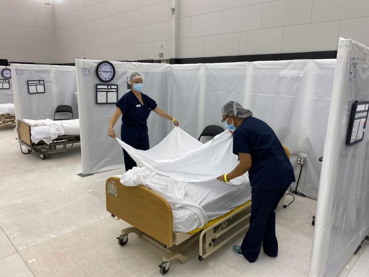  A health official in California's third largest county is urging hospitals to cancel elective surgeries and implement plans for an onslaught of COVID-19 patients, as intensive care units fill up statewide amid spiking virus cases. 