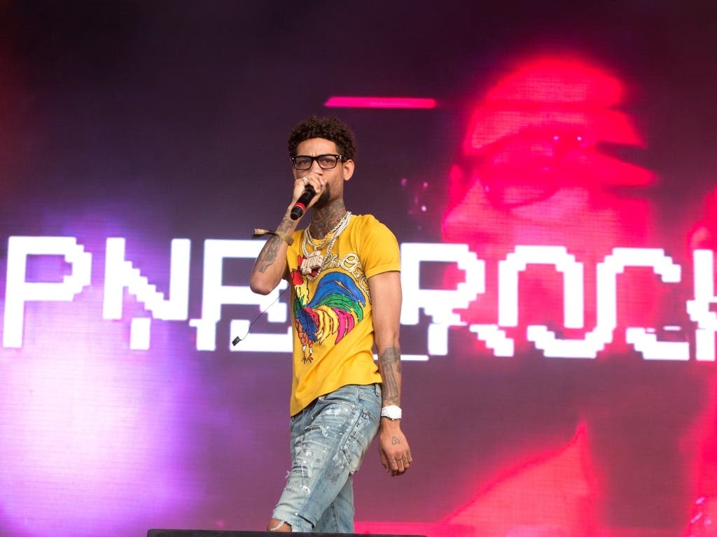 File photo: PnB Rock performs on Day 3 of the 2018 Firefly Music Festival at The Woodlands on Saturday, June 16, 2018, in Dover, Del.  PnB Rock was shot and killed in South Los Angeles Monday.