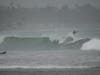 Surfers ride waves off Doheny State Park Beach in Dana Point, Calif., Sunday, Aug. 20, 2023. Tropical Storm Hilary swirled northward Sunday just off the coast.