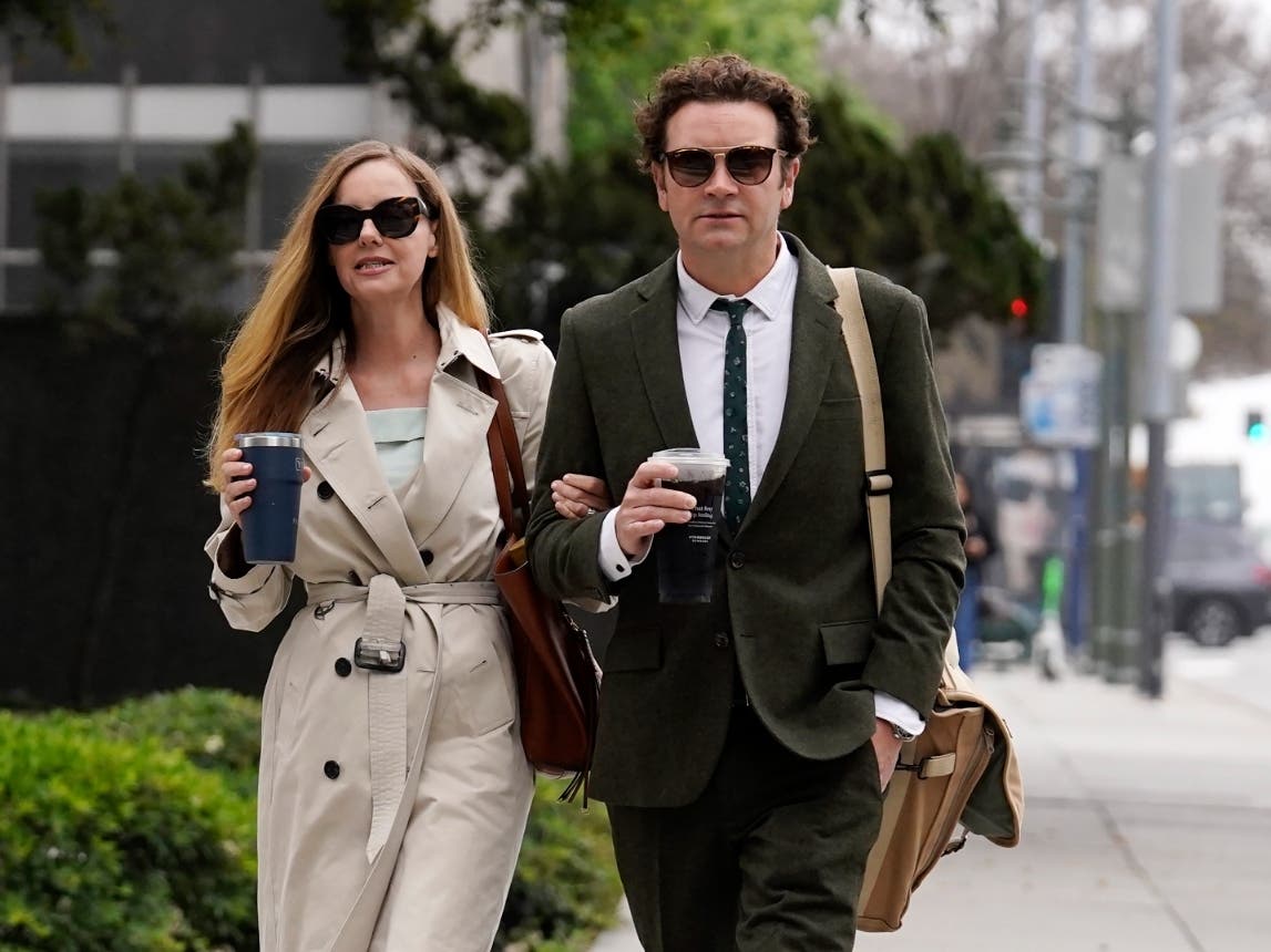 Danny Masterson, right, and his wife Bijou Phillips arrive for closing arguments in his second rape trial, May 16, 2023, in Los Angeles. On Monday, Sept. 18, Phillips filed for divorce from former “That '70s Show” star Masterson.