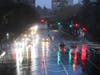 Motorists drive through storm conditions in downtown Los Angeles, Thursday, Feb. 1, 2024. The first of two back-to-back atmospheric rivers drenched California on Thursday, flooding roads and toppling trees while triggering statewide storm preparations.