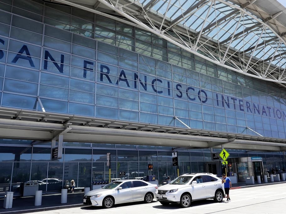 A viral video shows what appears to be plainclothes agents detaining a sobbing woman at San Francisco Airport Sunday night. 