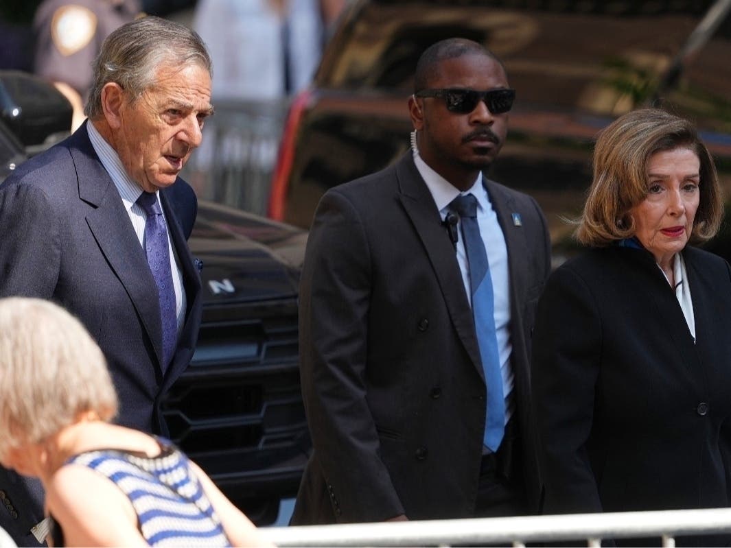Rep. Nancy Pelosi, D-Calif., and her husband Paul arrive at the funeral services for Clive Davis at Central Synagogue in New York, Monday, June 29, 2026.