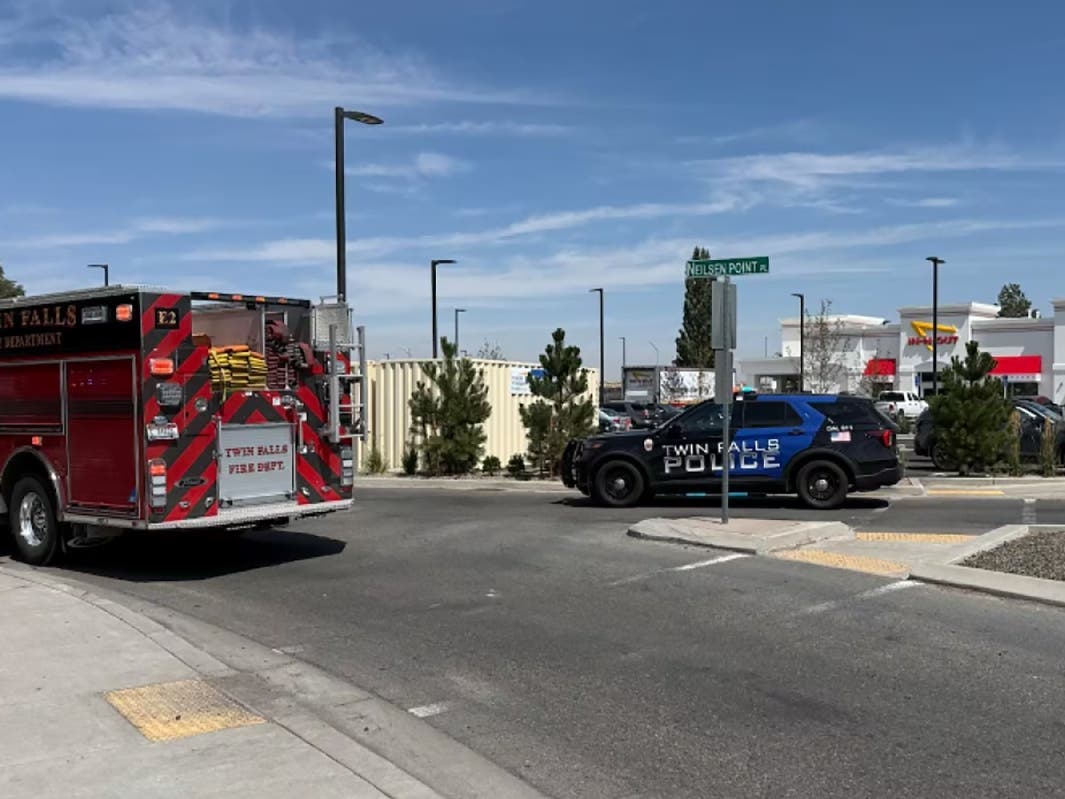 This image provided by KMVT shows the scene of a shooting that started at an In-N-Out Burger restaurant, Saturday, Aug. 1, 2026 in Twin Falls, Idaho.