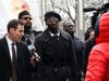 Brothers Olabinjo Osundairo, center, and Abimbola Osundairo, right, arrive at the Leighton Criminal Courthouse in Chicago.