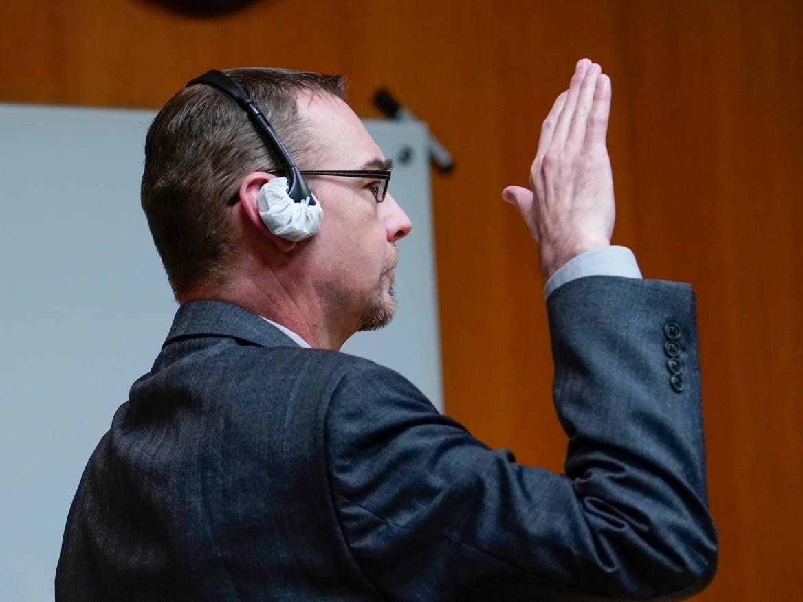 James Crumbley raises his right hand to swear he aware of his rights and has chosen not to testify in his case in the Oakland County Courtroom of Cheryl Matthews on Wednesday, March 13.