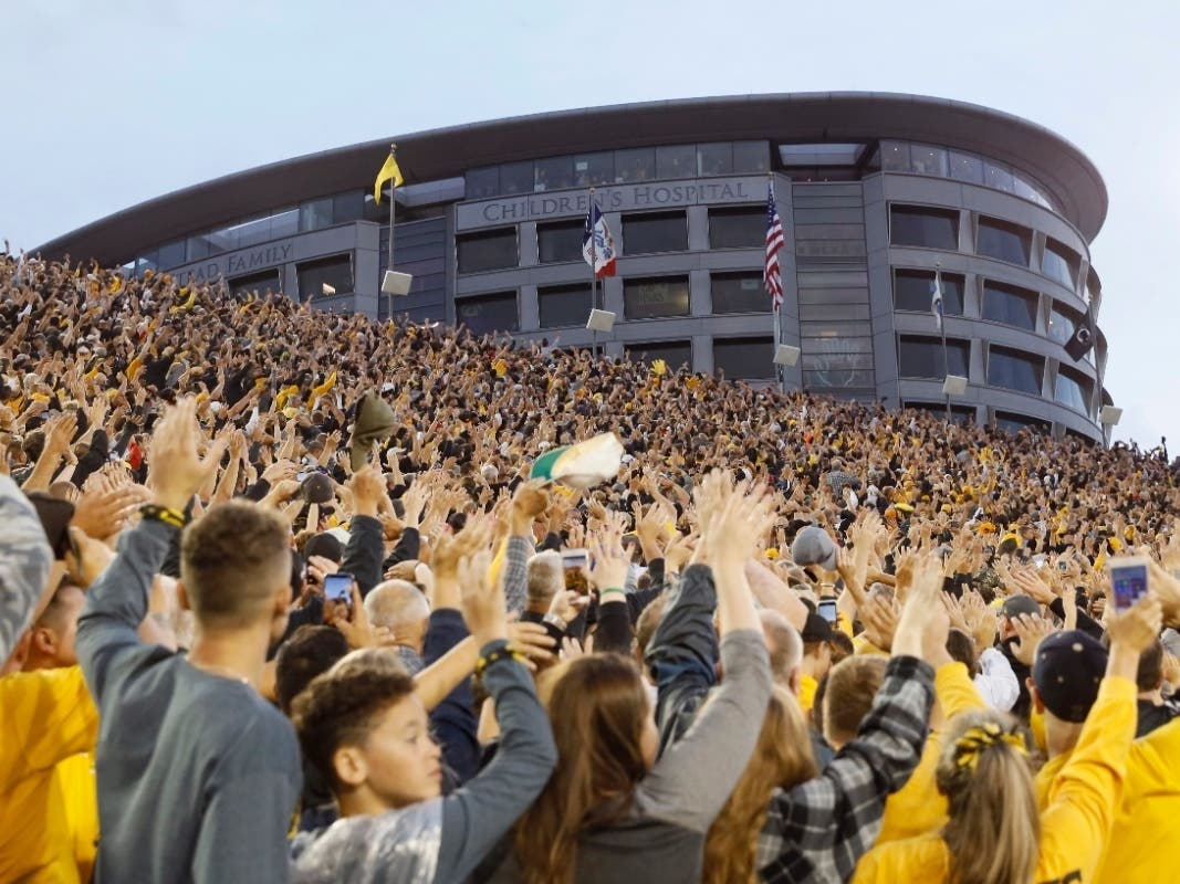 Patients University of Iowa Stead Family Children's Hospital geta wave from the fans every at every home game for the Iowa Hawkeyes. Now, whose joking "need beer" sign raised $225,000 is giving it to those children.