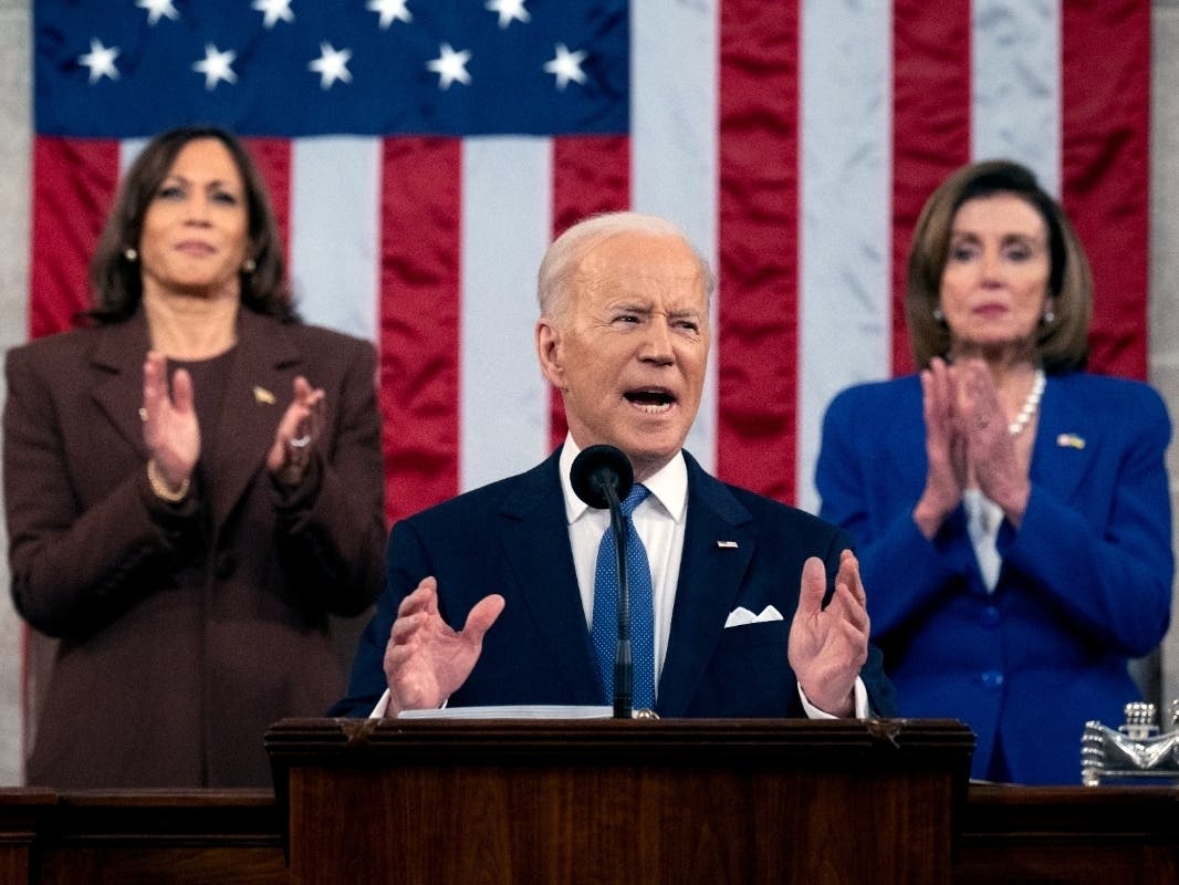 President Joe Biden, flanked by Vice President Kamala Harris on the left and House 
Speaker Nancy Pelosi on the right, delivers his  first State of the Union address to a joint session of Congress at the Capitol on Tuesday. 