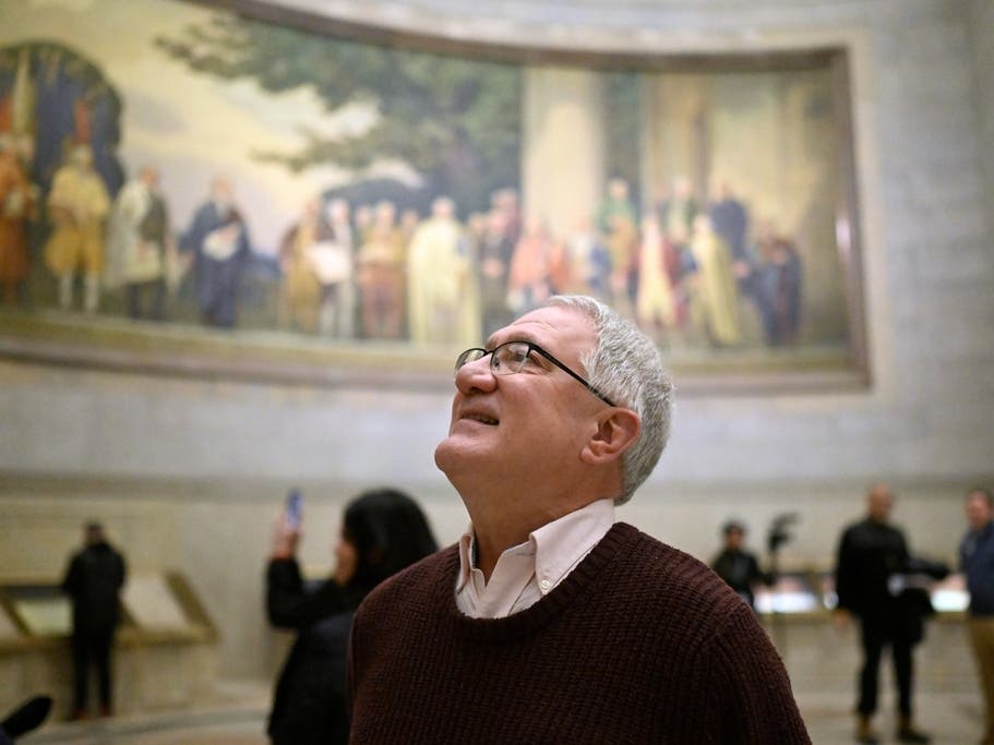 Kevin Sullivan, of Milwaukee, looks at a wall mural during a Jan. 29 trip to the National Archives, home to the nation's founding documents, including the one that being commemorated this year, the Declaration of Independence.