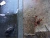 Blood is seen at the scene of a fatal overnight shooting Sunday, June 5, 2022, on South Street in Philadelphia.