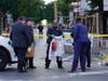 Philadelphia police investigators work the scene of a fatal overnight shooting on Sunday, June 5, 2022, on South Street in Philadelphia. 