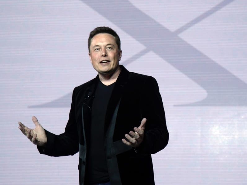 Elon Musk, CEO of Tesla Motors Inc., introduces the Model X car at the company's headquarters Tuesday, Sept. 29, 2015, in Fremont, Calif.