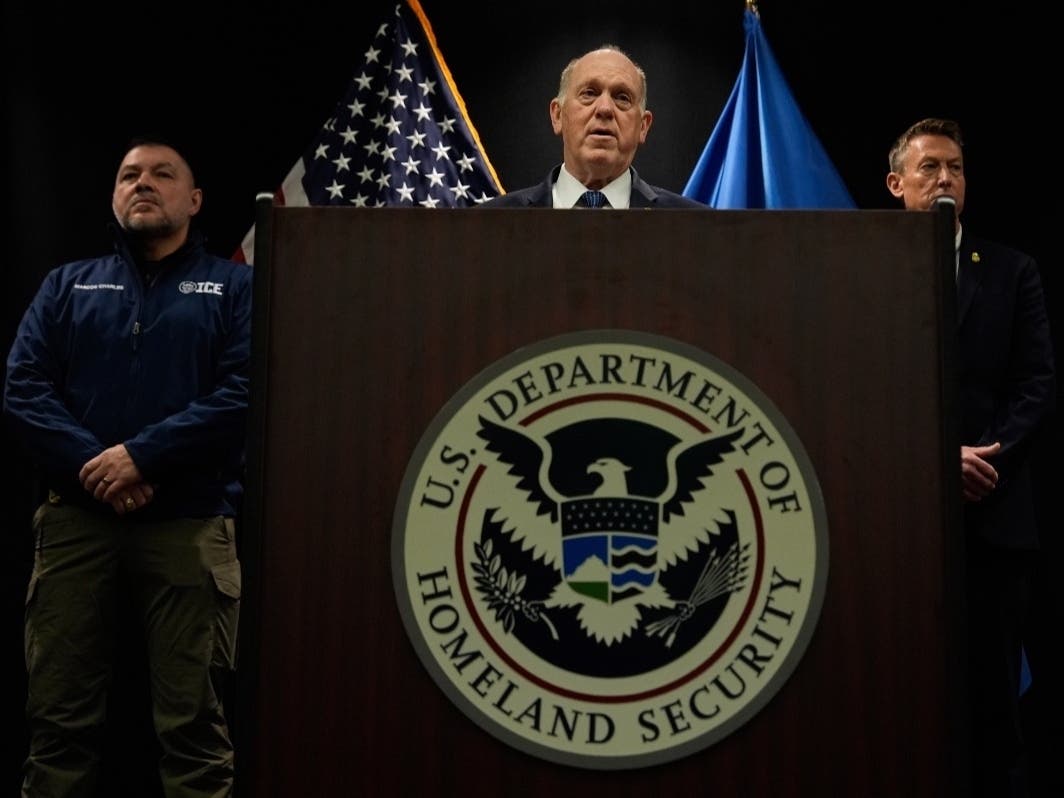 White House border czar Tom Homan holds a news conference as Marcos Charles and Rodney Scott, listen, at the Bishop Whipple Federal building on Thursday, Jan. 29, 2026 in Minneapolis.