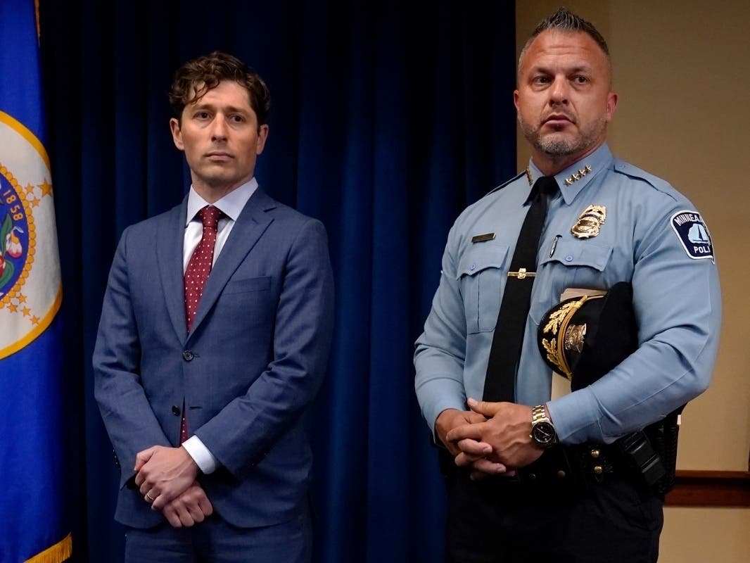Minneapolis Mayor Jacob Frey, left, and Police Chief Brian O'Hara stand during a news conference about a Department of Justice report that found the Minneapolis Police Department has engaged in a pattern or practice of discrimination, June 16, 2023.