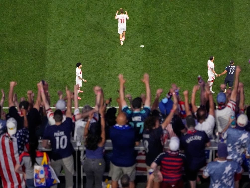 Fans celebrate after United States' Sebastian Berhalter (14) scored their second goal during the World Cup Group D soccer match between Turkey and the United States in Inglewood, Calif., near Los Angeles, Thursday, June 25, 2026.
