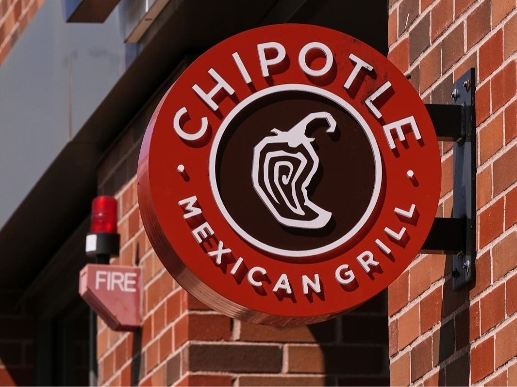 The Chipotle logo is displayed at a store, Aug. 13, 2025, in Newton, Mass.

