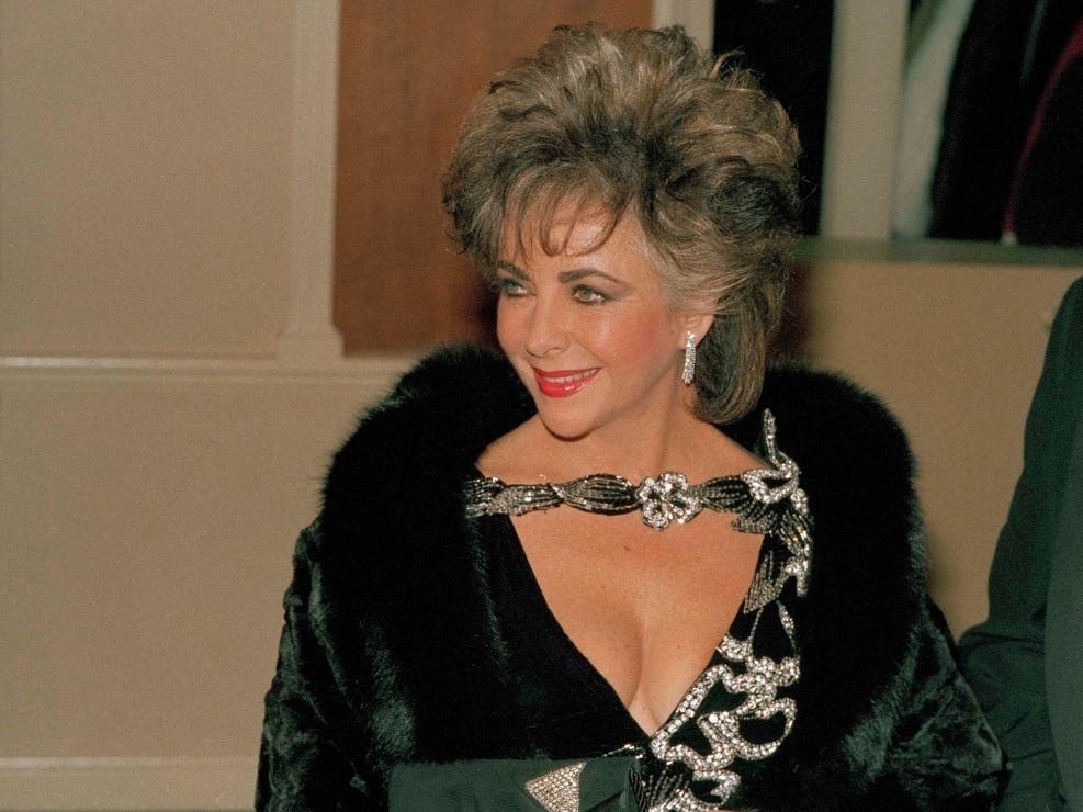 Actress Elizabeth Taylor arrives at the Beverly Hilton Hotel for the 42nd Annual Golden Globe Awards, hosted by the Hollywood Foreign Press Association, Jan. 26, 1985.