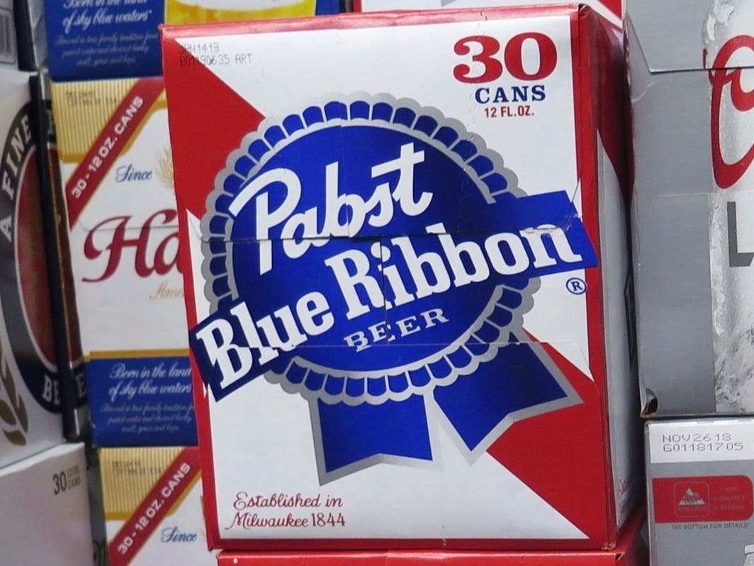 Cases of Pabst Blue Ribbon beer are stacked in a liquor store, Nov. 8, 2018, in Milwaukee.
