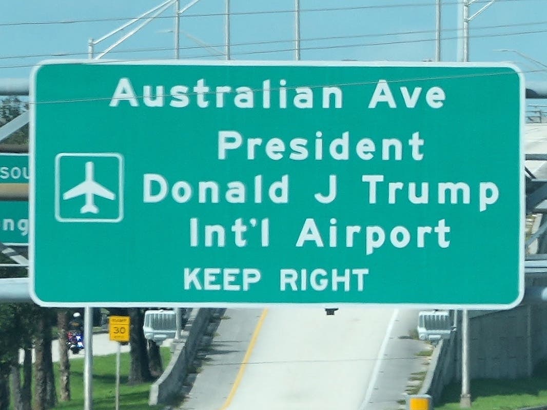 A sign for President Donald J. Trump International Airport is pictured, Saturday, Oct. 17, 2026, in West Palm Beach, Fla.