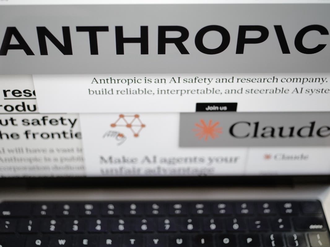 Pages from the Anthropic website and the company's logos are displayed on a computer screen in New York on Thursday, Feb. 26, 2026.